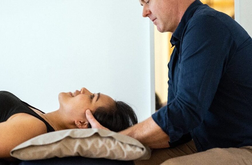 Osteopath providing hands-on treatment at Balance Osteopathy in Melbourne Osteopathic treatment for back pain at Balance Osteopathy clinic